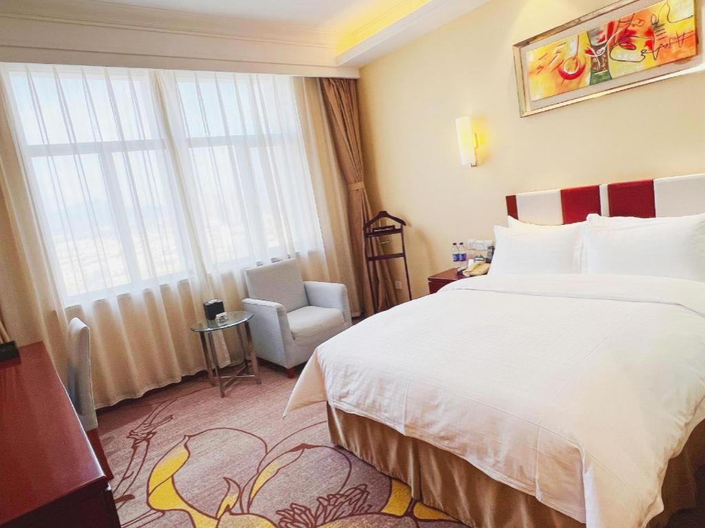 Qingdao Blue Horizon Hotel Licang Экстерьер фото