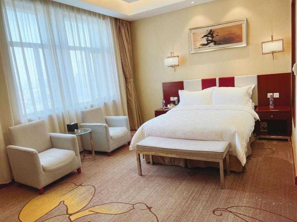 Qingdao Blue Horizon Hotel Licang Экстерьер фото