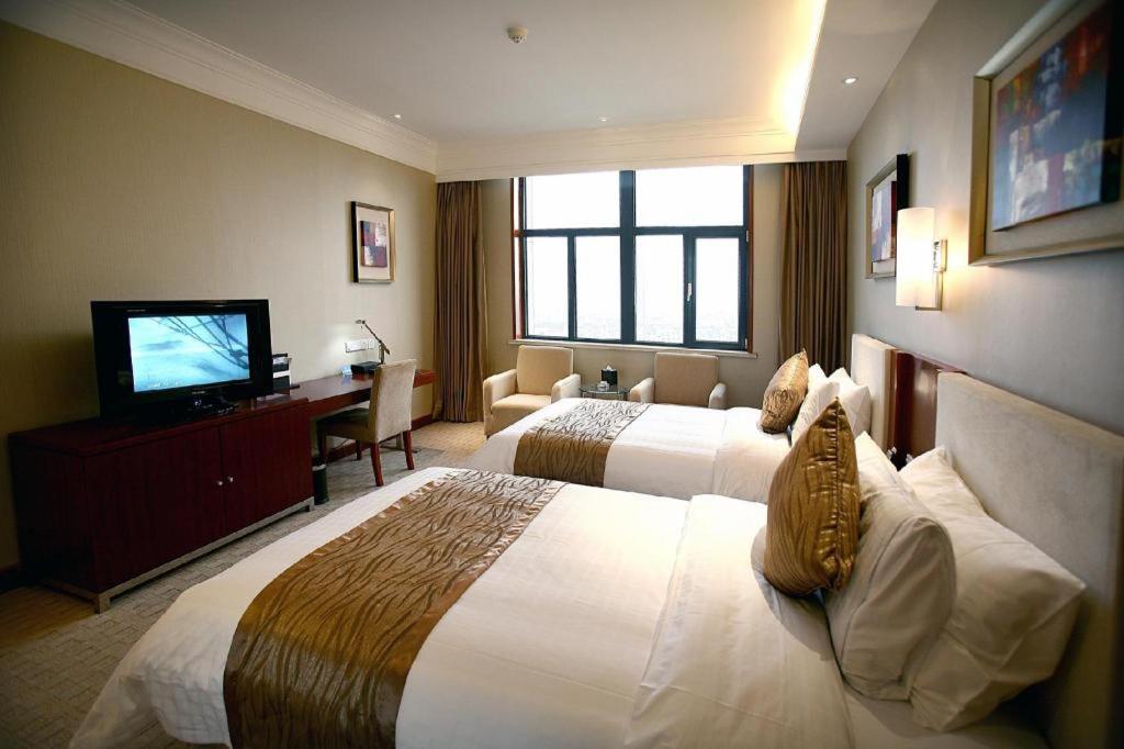 Qingdao Blue Horizon Hotel Licang Экстерьер фото